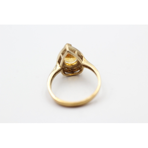 86 - 9ct gold cirtine and diamond pear halo gemstone ring (3.5g) Size P