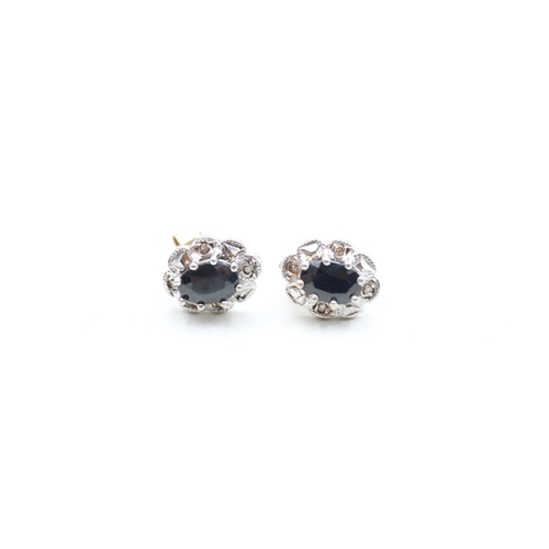 89 - 9ct gold sapphire and diamond halo stud earrings (1.5g)