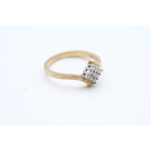 92 - 9ct gold diamond twist ring (1.9g) Size L 1/2