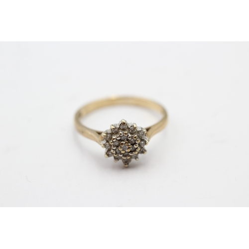 93 - 9ct gold diamond cluster ring (2.2g) Size M