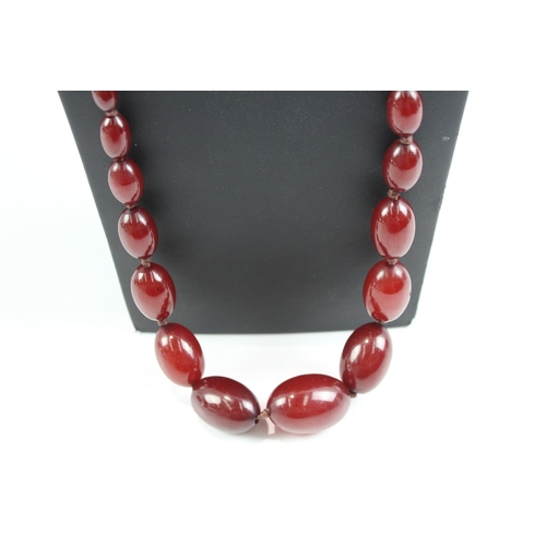 269 - Graduated Cherry Bakelite Necklace, Individually Knotted 69g