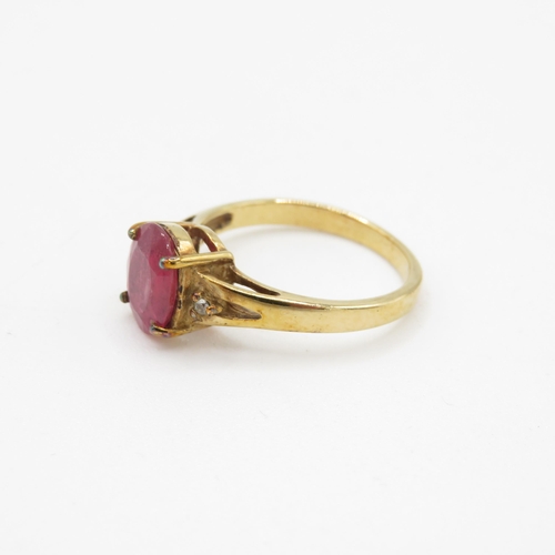 127 - 9ct gold enhanced ruby and white gemstone ring (3g) Size N