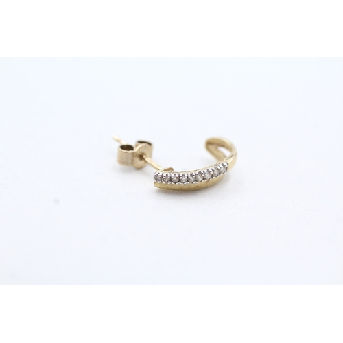 106 - 9ct gold diamond half hoops earring (1g)