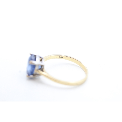 107 - 9ct gold blue gemstone set solitaire ring (2.1g) Size N 1/2