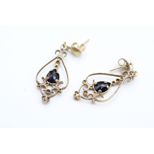 111 - 9ct gold pear cut sapphire set drop earrings (1.9g)