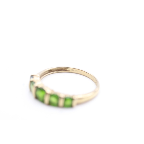 113 - 9ct gold diopside row ring (1.9g) Size Q