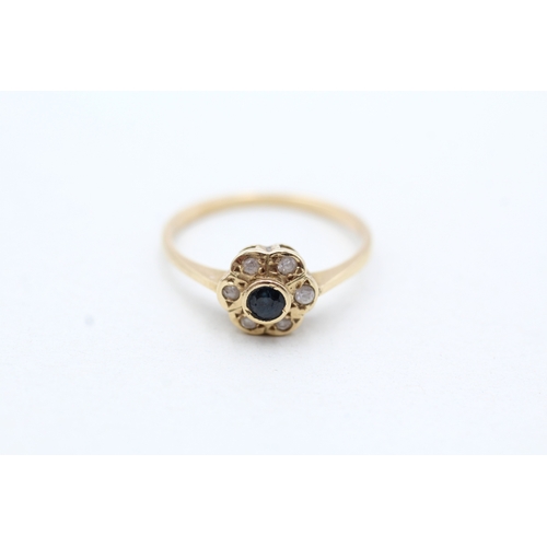 115 - 14ct gold sapphire and white gemstone halo ring (2.1g) Size O 1/2