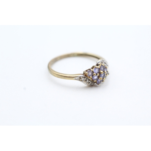 118 - 9ct gold tanzanite and diamond cluster twist ring (1.6g) Size P