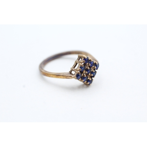 128 - 9ct gold sapphire square cluster ring (2.3g) Size M