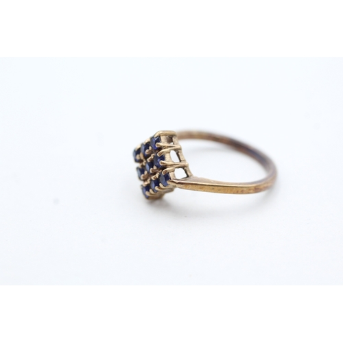 128 - 9ct gold sapphire square cluster ring (2.3g) Size M