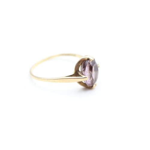 131 - 9ct gold Modernist amethyst set dress ring (2.3g) Size T 1/2