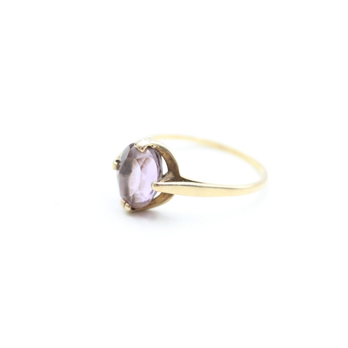 131 - 9ct gold Modernist amethyst set dress ring (2.3g) Size T 1/2