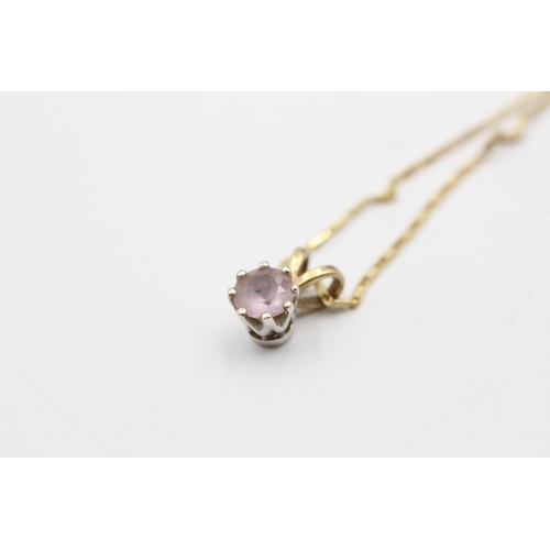 133 - 9ct gold pink topaz single stone pendant on chain (2.4g)