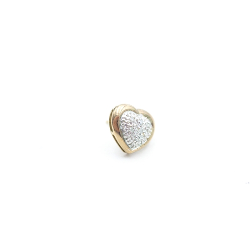 135 - 9ct gold parve set diamond heart shape stud earrings (2.3g)