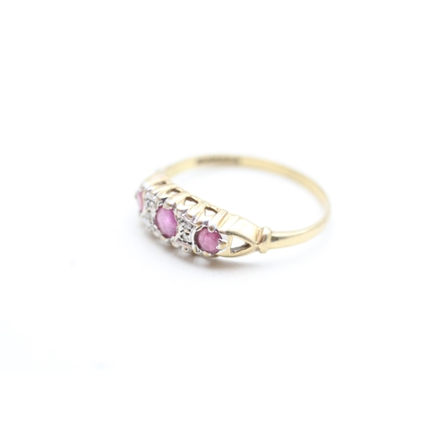 142 - 9ct gold ruby and diamond framed trilogy ring (1.7g) Size Q 1/2