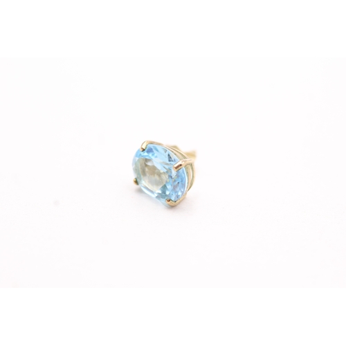 143 - 9ct gold oval cut blue gemstone stud earrings (2.3g)