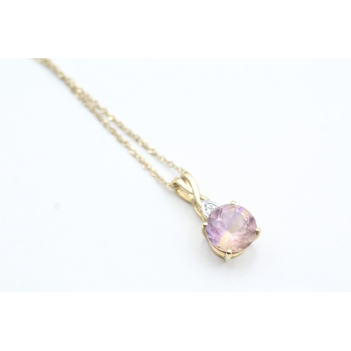 149 - 9ct gold diamond and ametrine drop pendant on chain (2.7g)