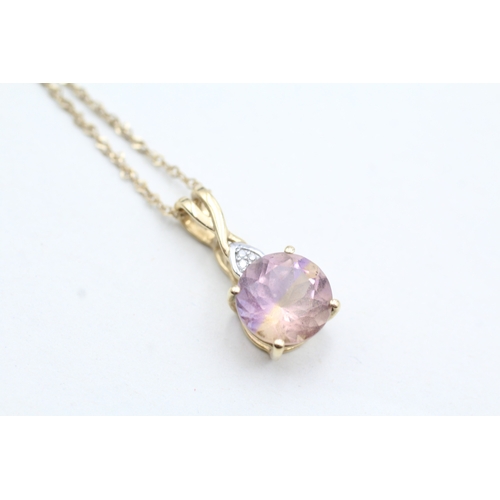 149 - 9ct gold diamond and ametrine drop pendant on chain (2.7g)