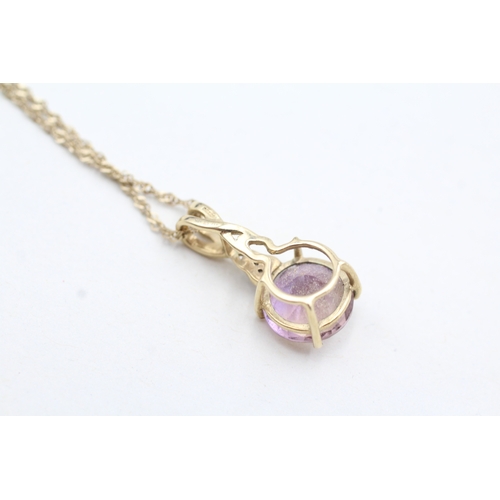 149 - 9ct gold diamond and ametrine drop pendant on chain (2.7g)