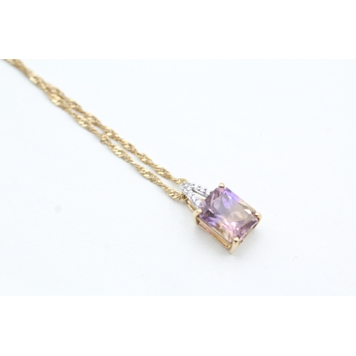 150 - 9ct gold diamond and ametrine pendant on chain (2.4g)