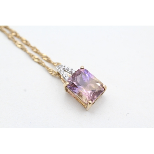 150 - 9ct gold diamond and ametrine pendant on chain (2.4g)