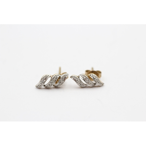 154 - 9ct gold diamond twist stud earrings (1.1g)