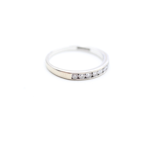 17 - 18ct white gold diamond set nine stone eternity ring (2.4g)