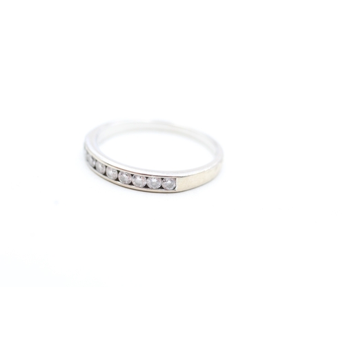 17 - 18ct white gold diamond set nine stone eternity ring (2.4g)