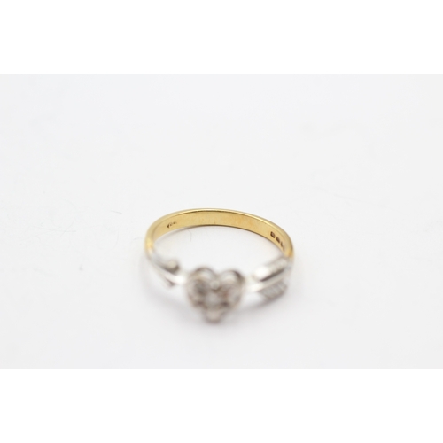 175 - 18ct gold diamond heart and arrow ring (2.2g) Size J