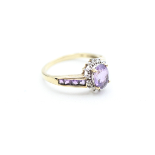 177 - 9ct gold amethyst and diamond halo twist ring (2.8g) Size P