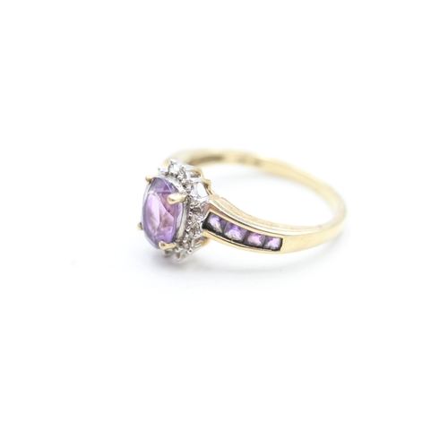 177 - 9ct gold amethyst and diamond halo twist ring (2.8g) Size P