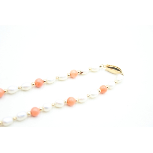 179 - 2x 14ct gold seed pearl & coral necklace (15.7g)