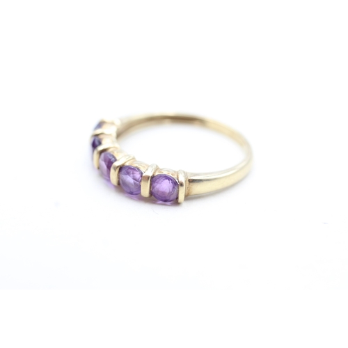 183 - 9ct gold amethyst five stone ring (2g) Size Q