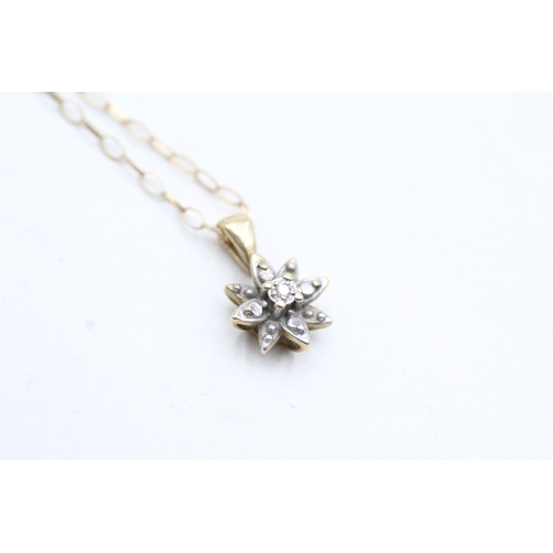 198 - 9ct gold diamond cluster pendant on chain (1.5g)