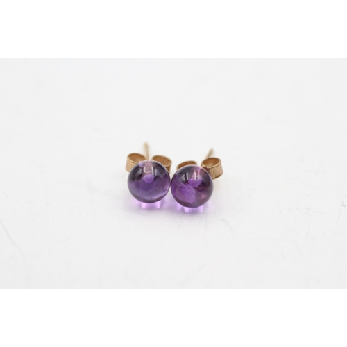 203 - 9ct gold amethyst sphere stud earrings (1g)