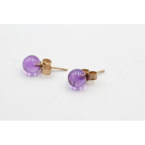 203 - 9ct gold amethyst sphere stud earrings (1g)