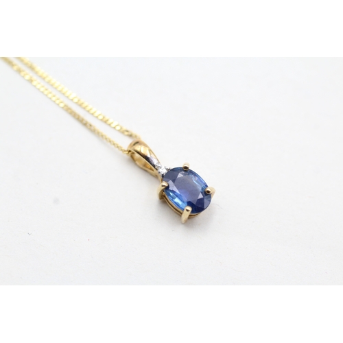 204 - 9ct gold kyanite & diamond pendant necklace (1.5g)