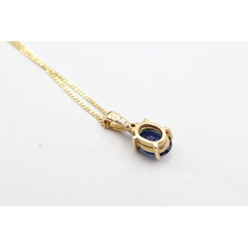 204 - 9ct gold kyanite & diamond pendant necklace (1.5g)