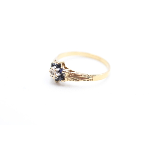 211 - 9ct gold sapphire and diamond floral halo ring (1.5g) Size P