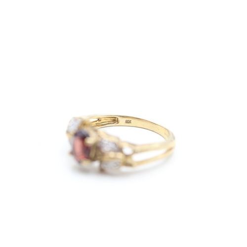 218 - 9ct gold diamond and garnet set dress ring (3.4g) Size N 1/2