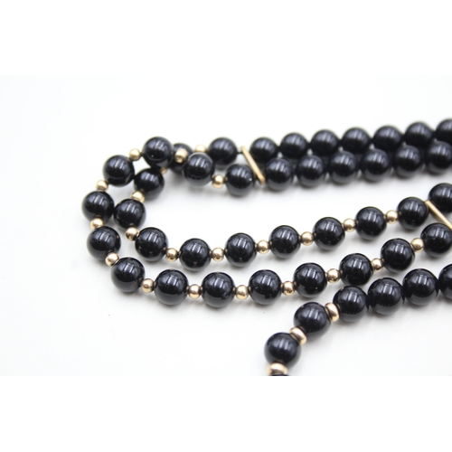 222 - 2x 9ct gold black onyx necklaces (57.7g)