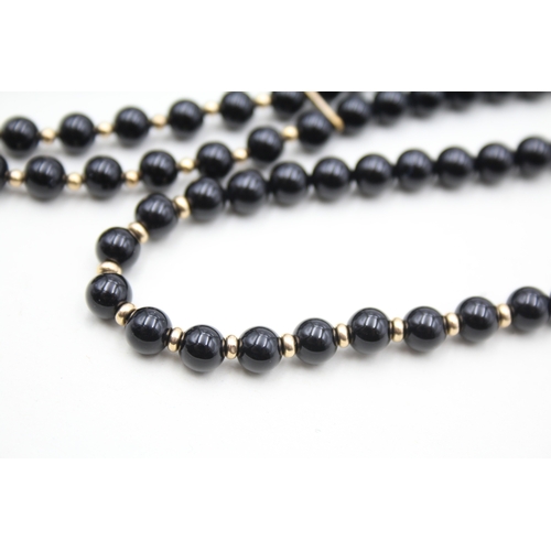 222 - 2x 9ct gold black onyx necklaces (57.7g)