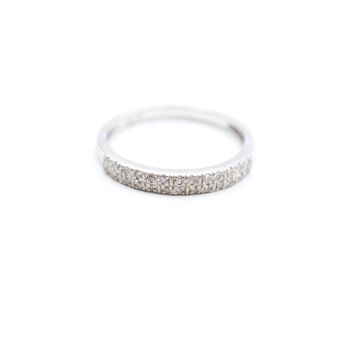 228 - 9ct gold diamond half eternity ring (2.1g) Size R