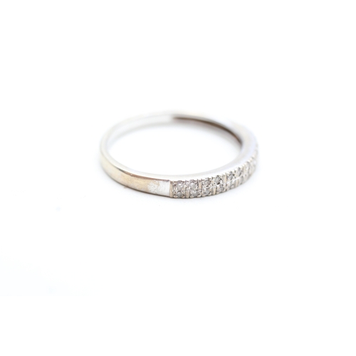 228 - 9ct gold diamond half eternity ring (2.1g) Size R