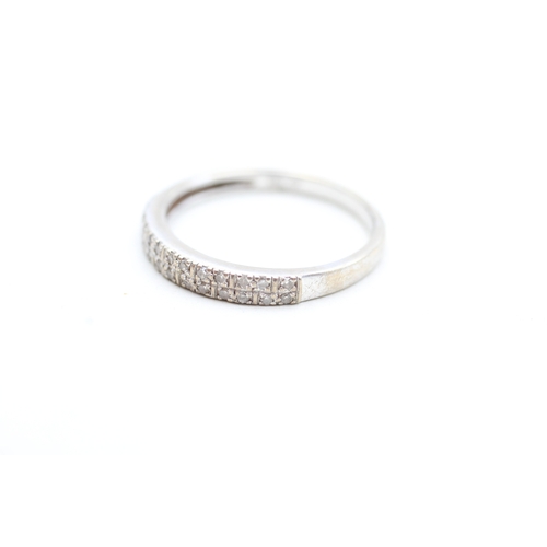 228 - 9ct gold diamond half eternity ring (2.1g) Size R