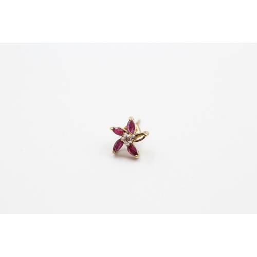 231 - 9ct gold ruby and diamond flower stud earring (1.2g)