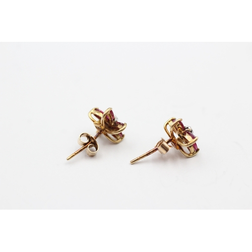 231 - 9ct gold ruby and diamond flower stud earring (1.2g)