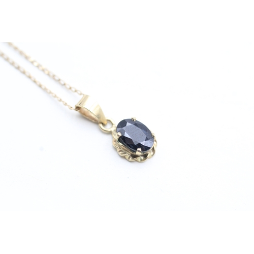 234 - 9ct gold sapphire set pendant necklace (1.5g)