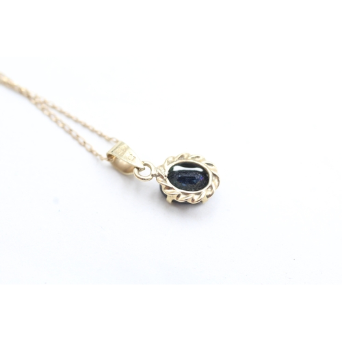 234 - 9ct gold sapphire set pendant necklace (1.5g)