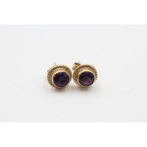 238 - 9ct gold amethyst stud earrings (1.9g)